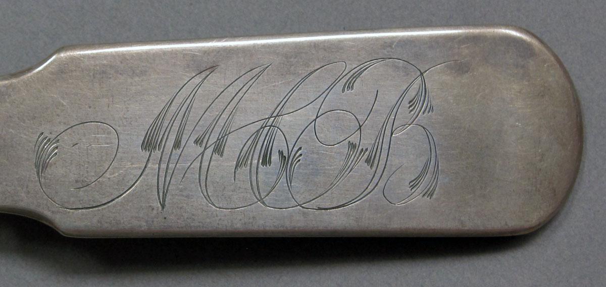 1962.0240.1374 Silver spoon engraving