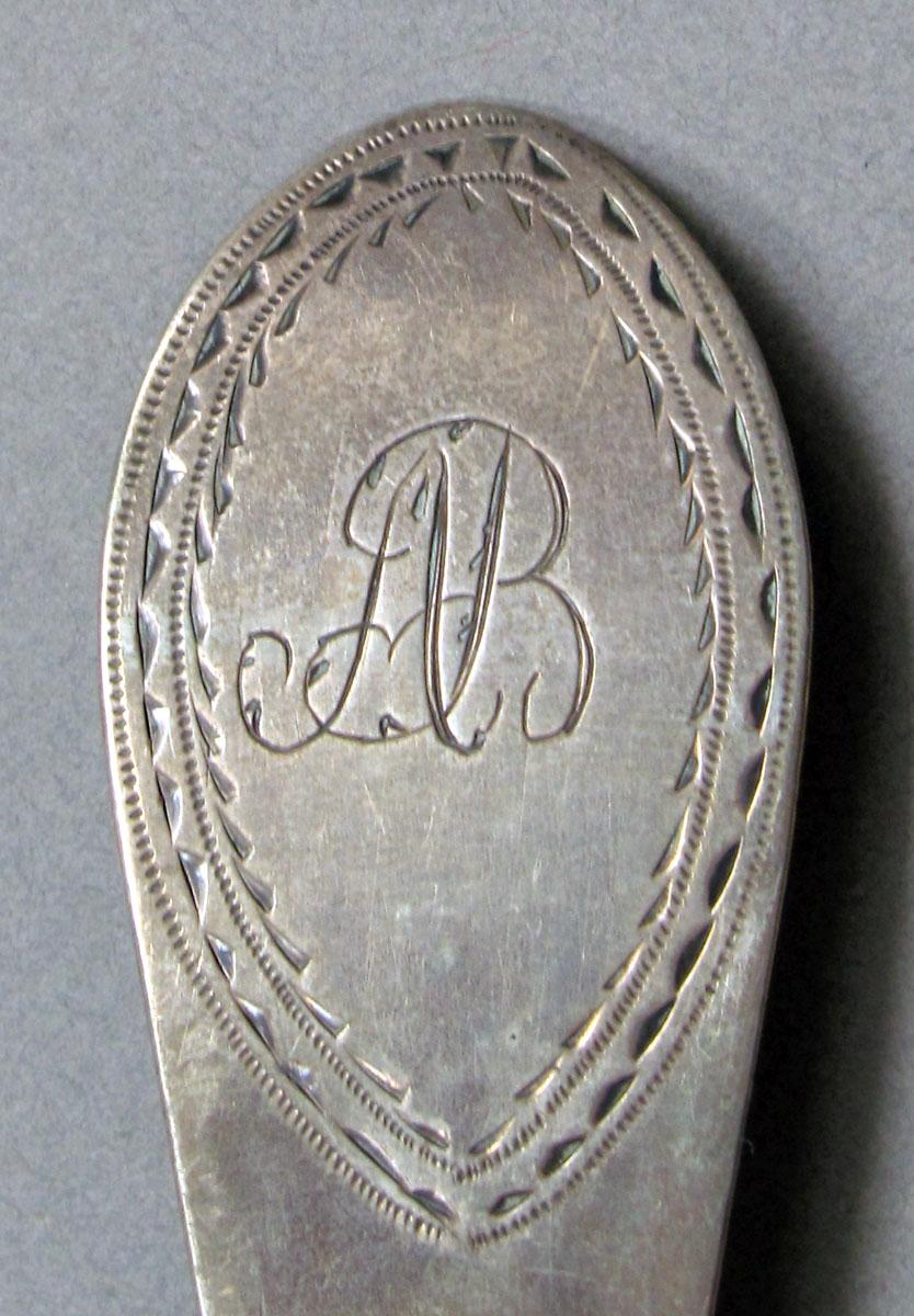 1962.0240.1375 Silver spoon engraving