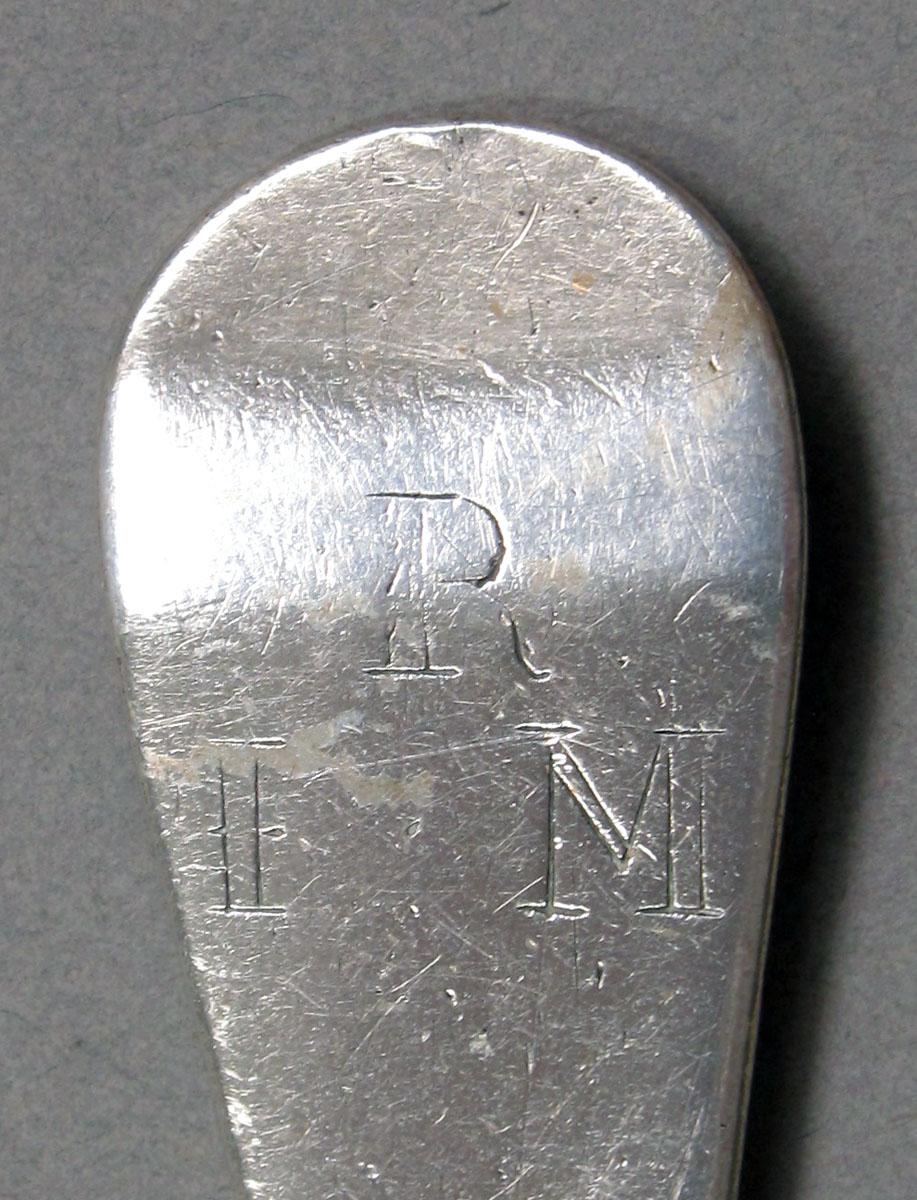 1962.0240.1376 Silver spoon engraving