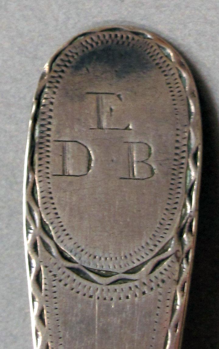 1962.0240.1380 Silver spoon engraving