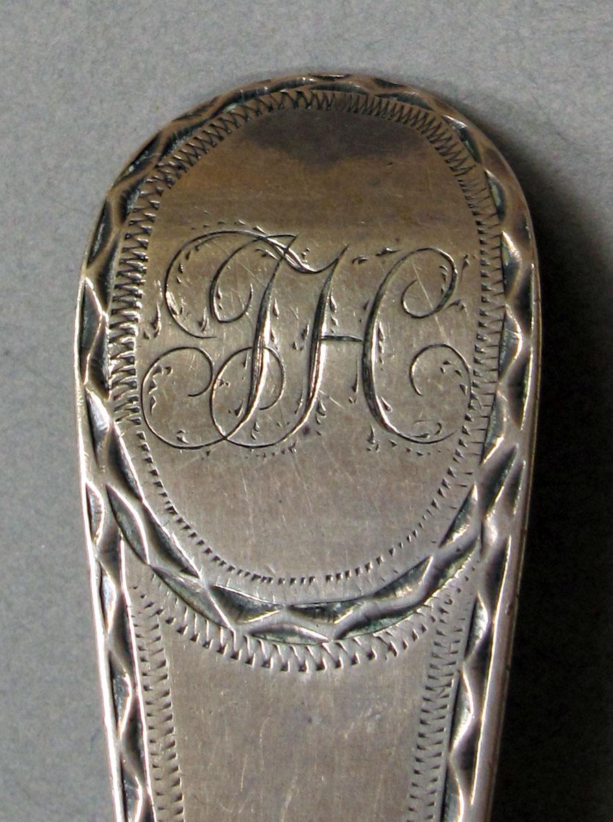 1962.0240.1381 Silver spoon engraving
