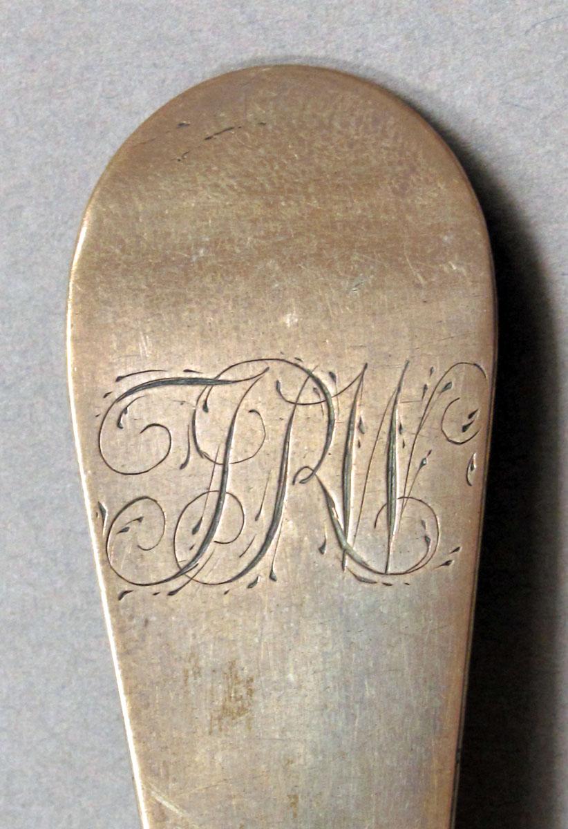 1962.0240.1384 Silver spoon engraving