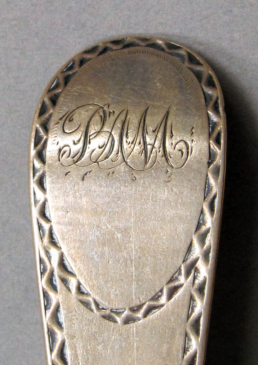 1962.0240.1385 Silver spoon engravin