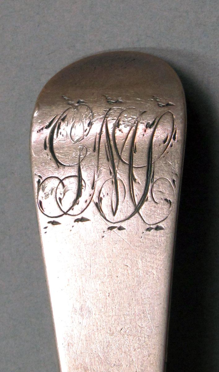1962.0240.1386 Silver spoon engraving