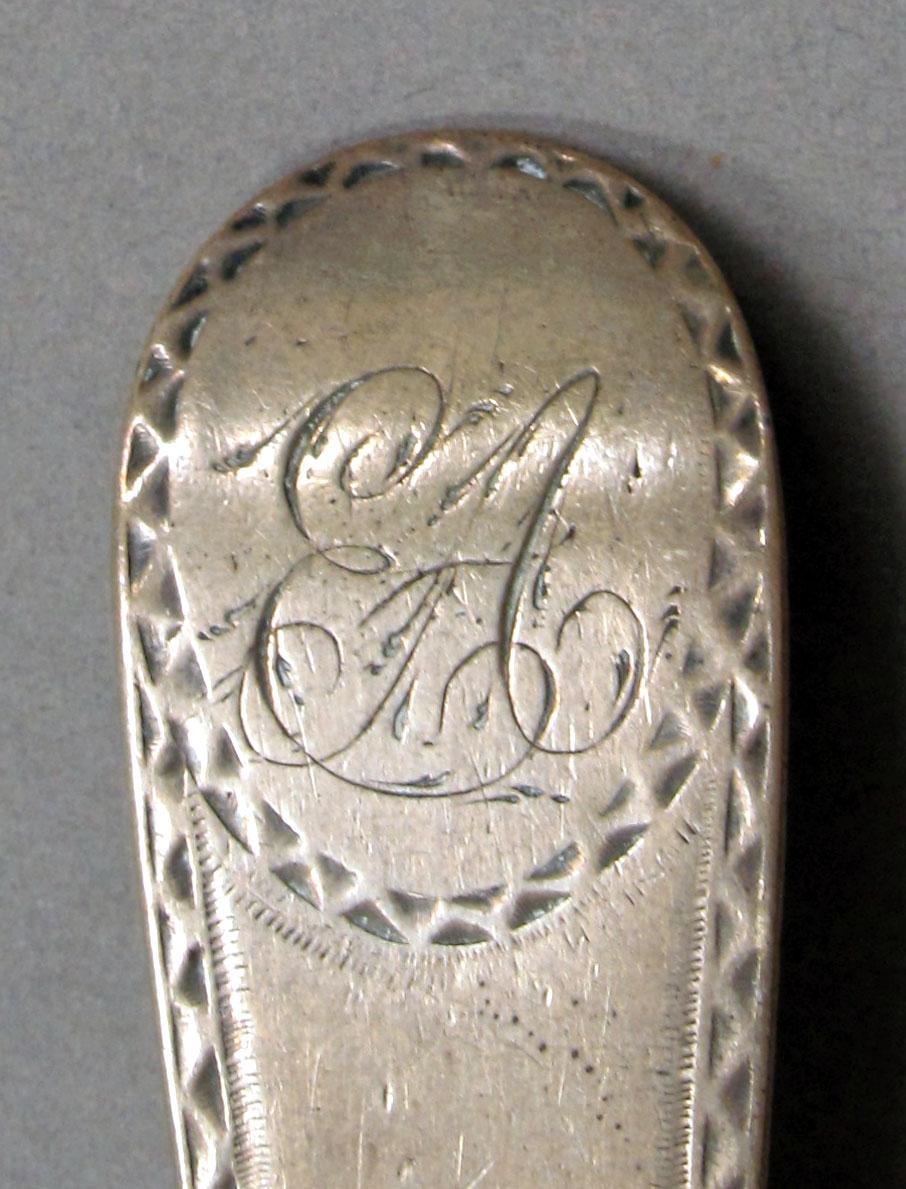1962.0240.1391 Silver spoon engraving