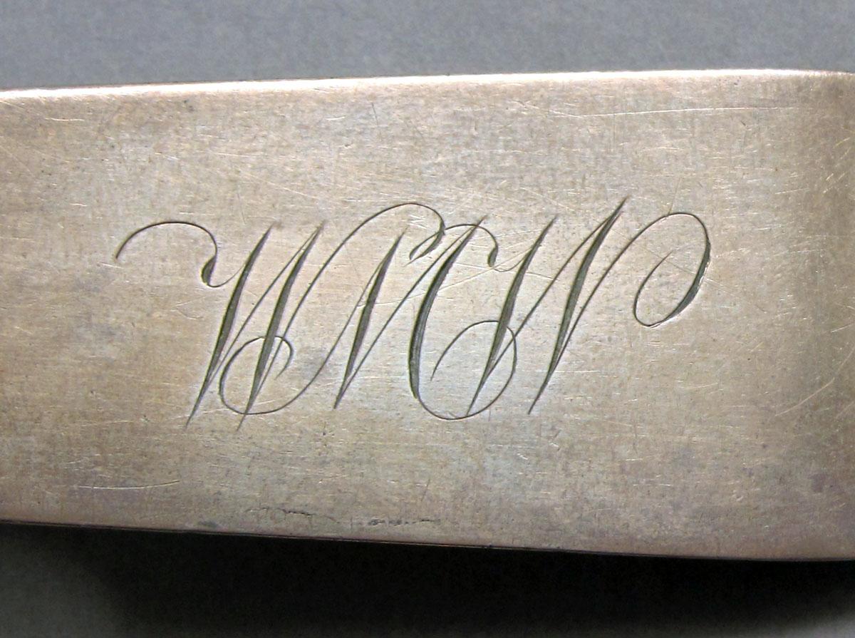 1962.0240.1394 Silver spoon engraving