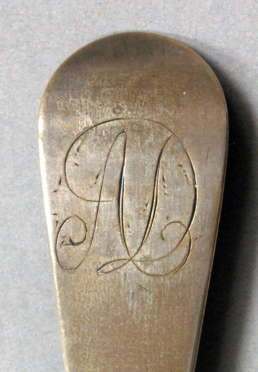 1962.0240.1395 Silver spoon engraving