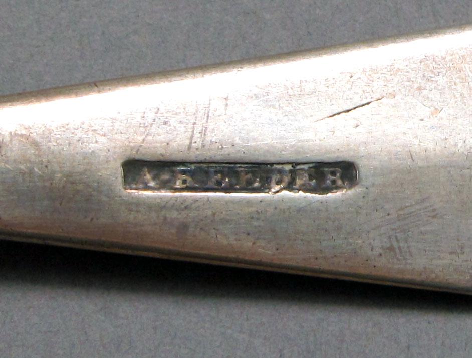 1962.0240.1395 Silver spoon mark