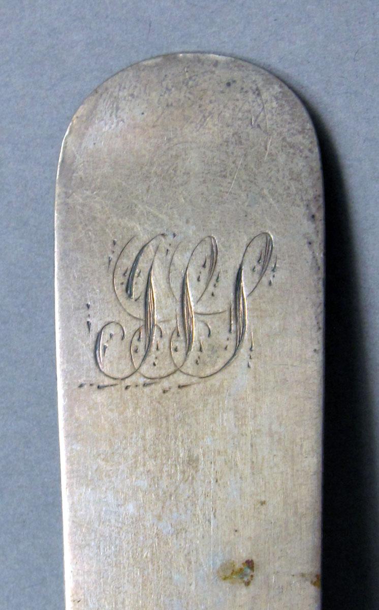 1962.0240.1396 Silver spoon engraving