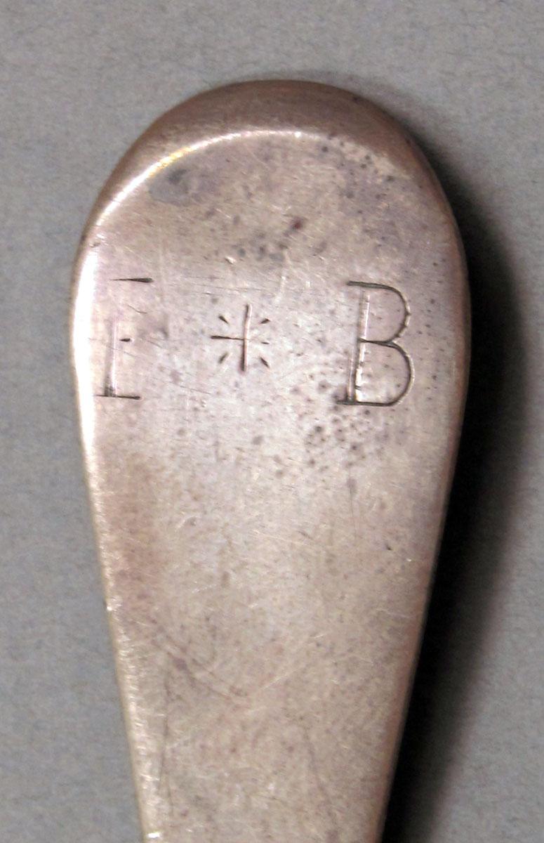 1962.0240.1398 Silver spoon engraving