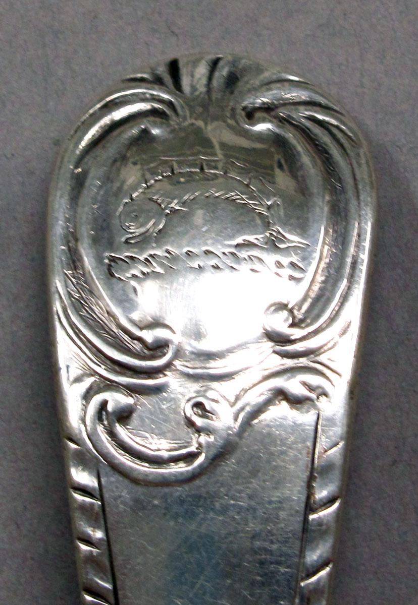 1962.0240.1403 Silver spoon engraving