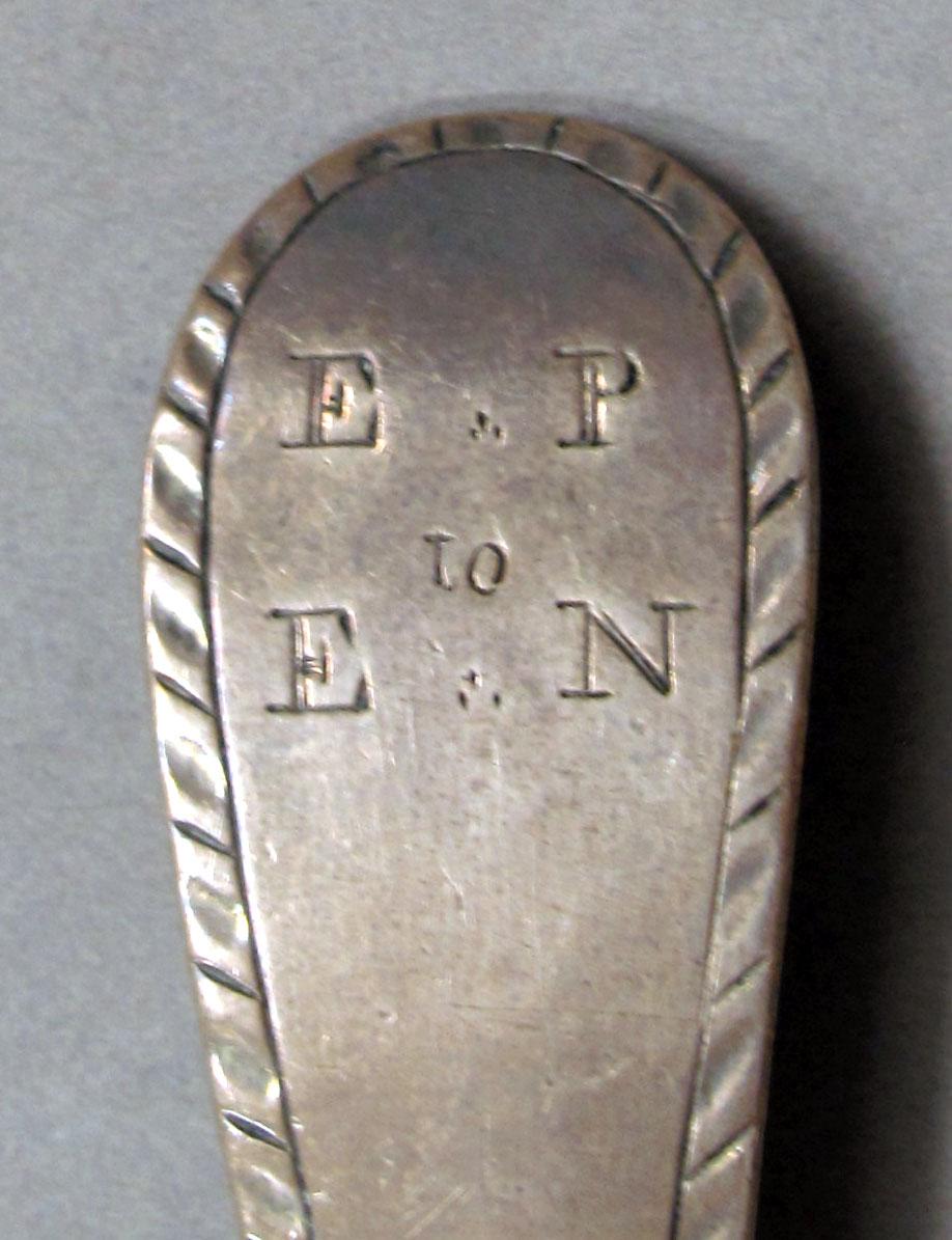 1962.0240.1404 Silver spoon engraving