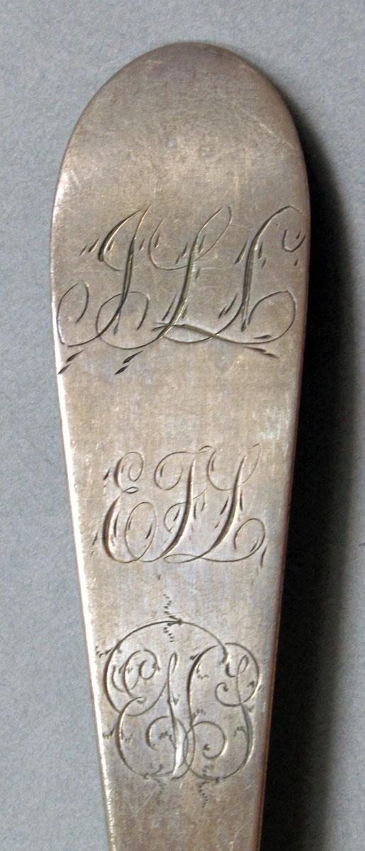 1962.0240.1406 Silver spoon engraving