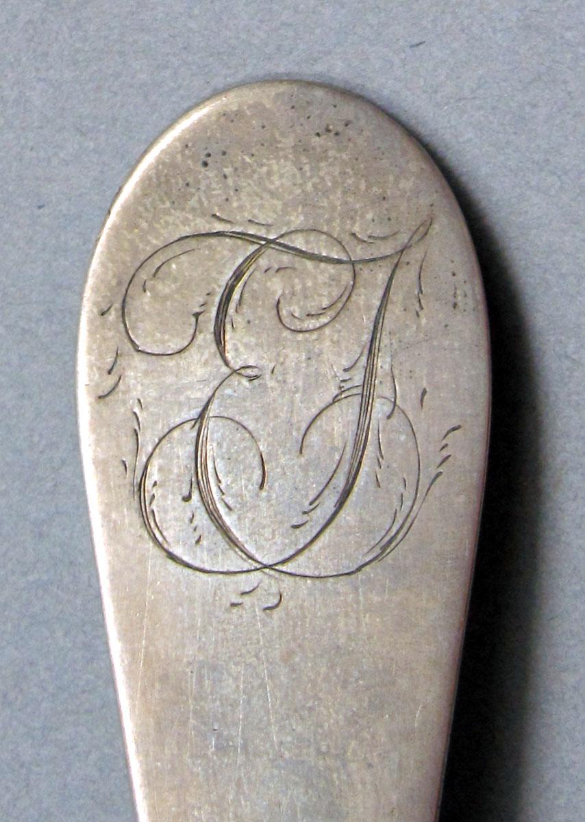 1962.0240.1407 Silver spoon engraving