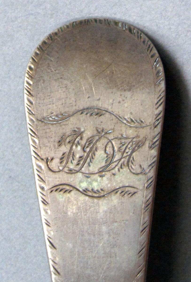 1962.0240.1417 Silver spoon engraving