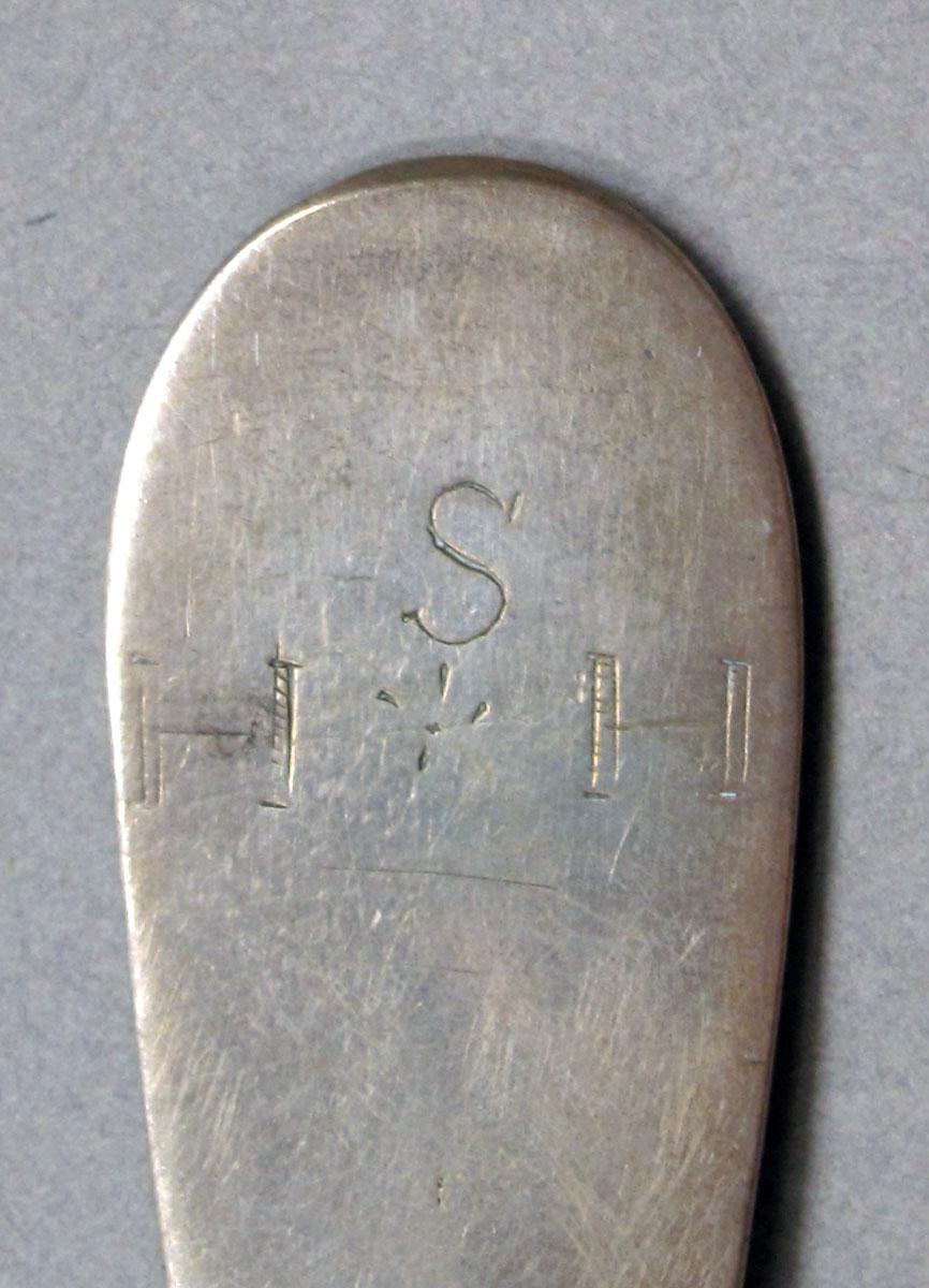 1962.0240.1418 Silver spoon engraving
