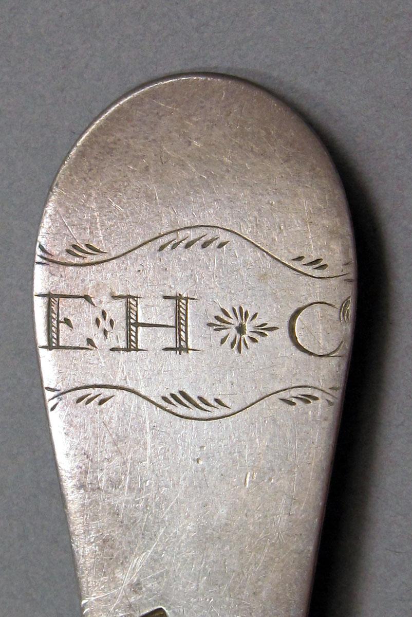 1962.0240.1420 Silver spoon engraving