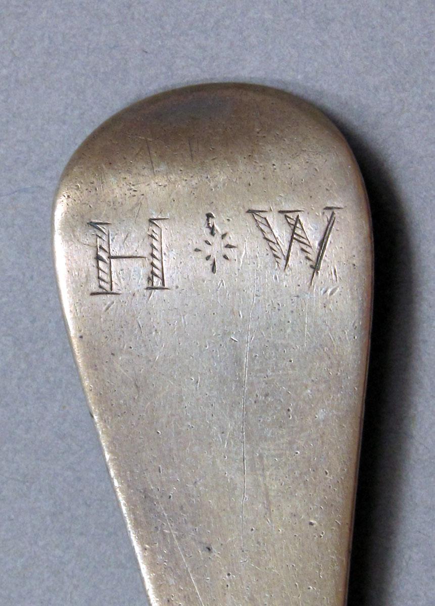 1962.0240.1423 Silver spoon engraving
