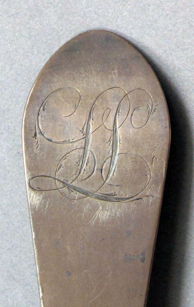 1962.0240.1424 Silver spoon engraving