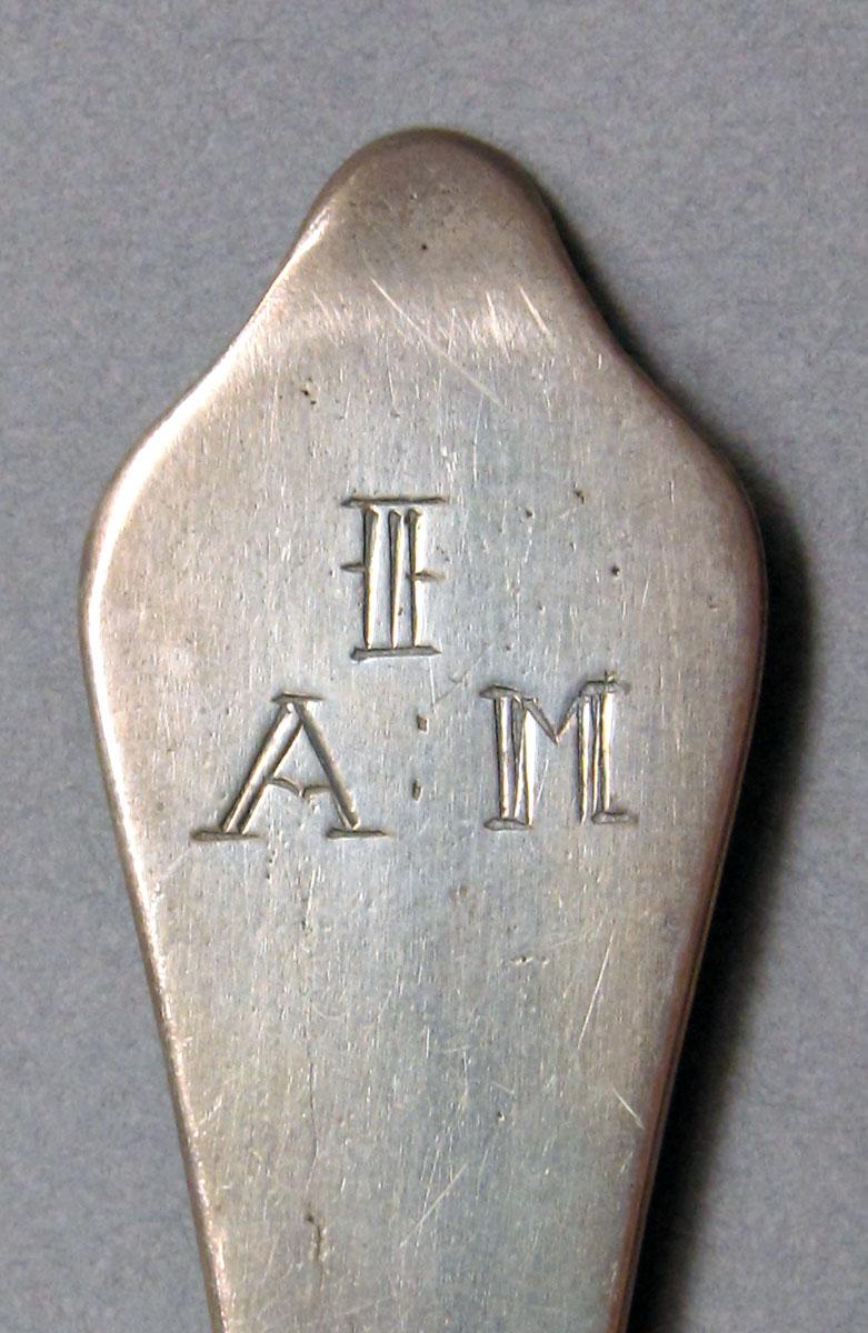 1962.0240.1427 Silver spoon engraving