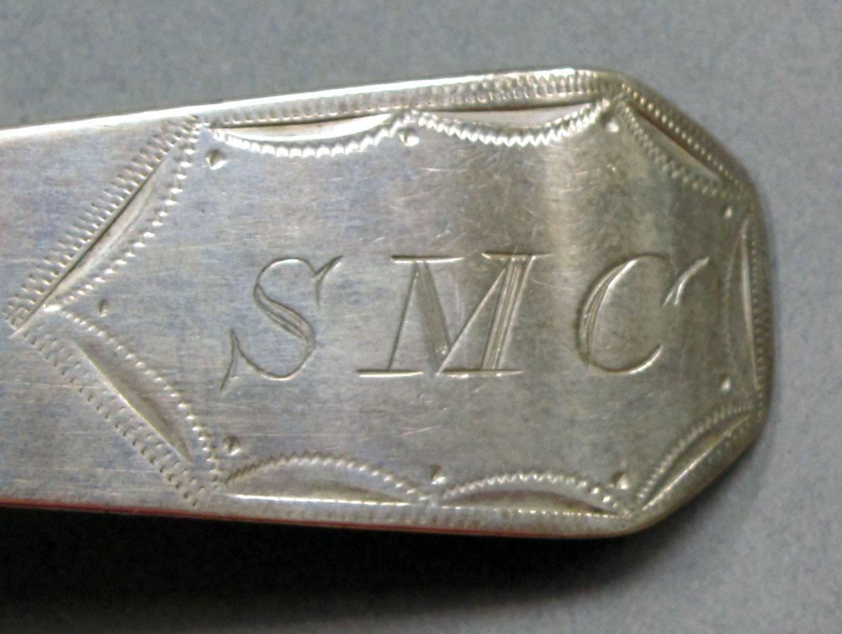1962.0240.1429 Silver spoon engraving