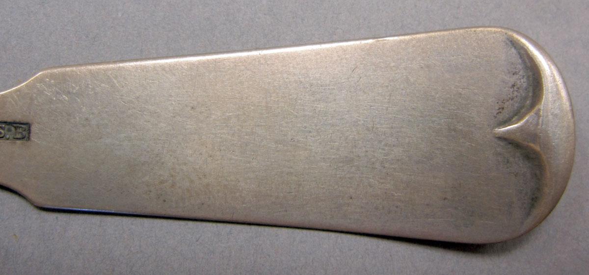 1962.0240.142 teaspoon handle underside