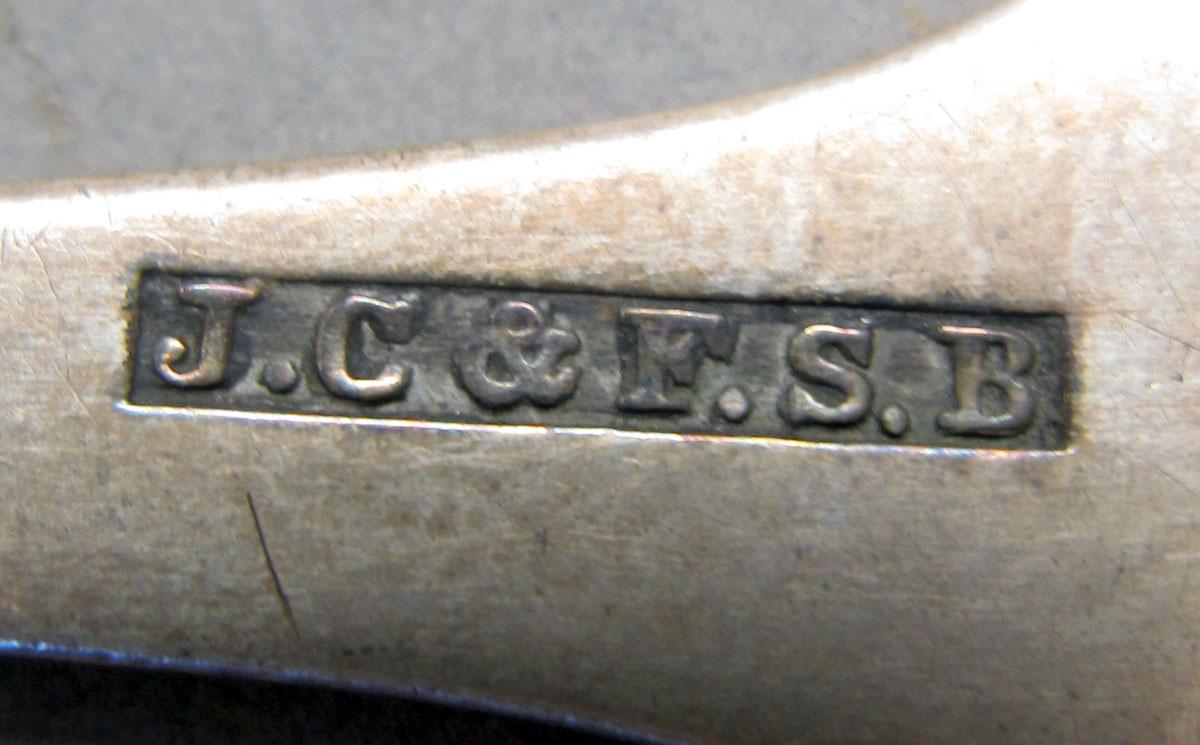 1962.0240.142 teaspoon mark