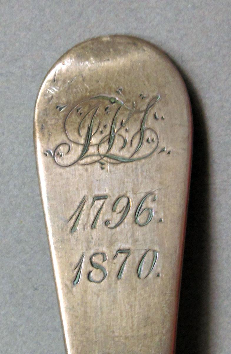 1962.0240.1431 Silver spoon engraving