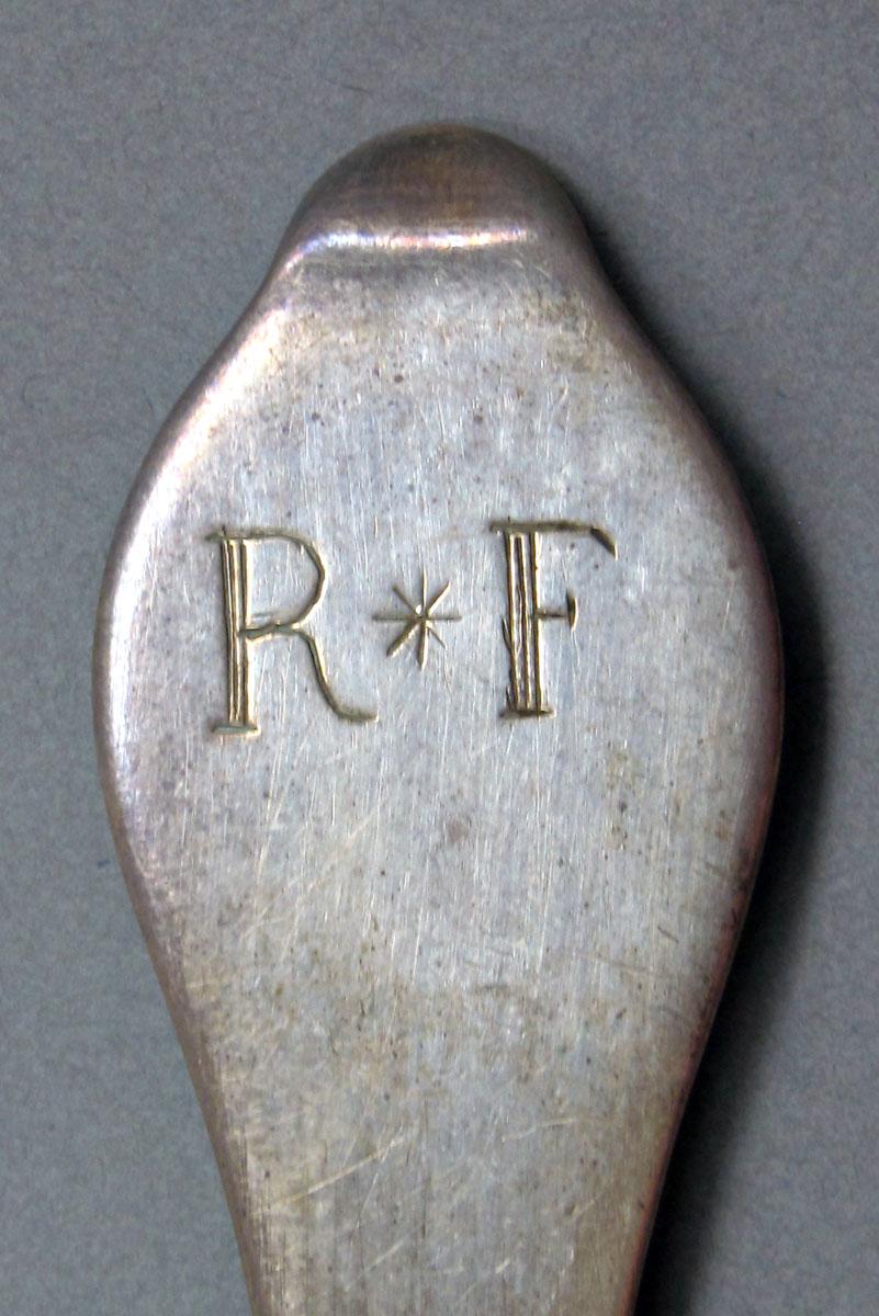 1962.0240.1432 Silver spoon engraving
