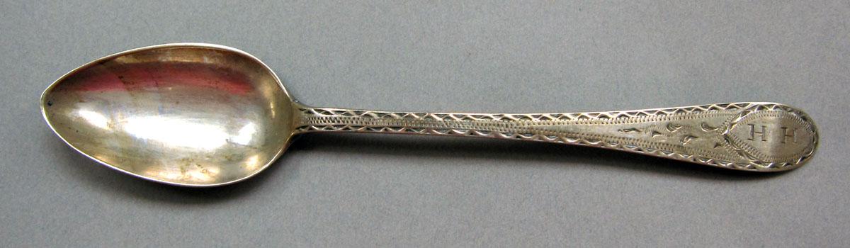 1962.0240.1437 Silver spoon upper surface