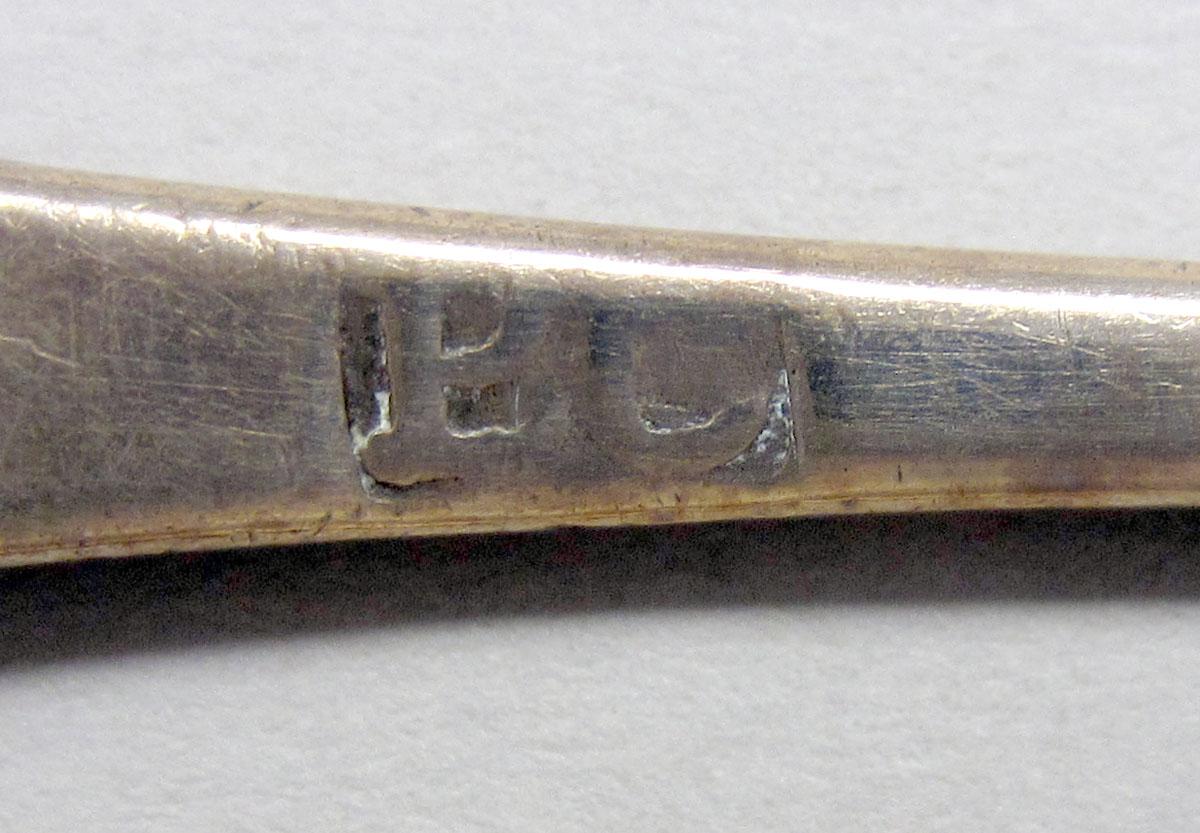 1962.0240.143 teaspoon mark