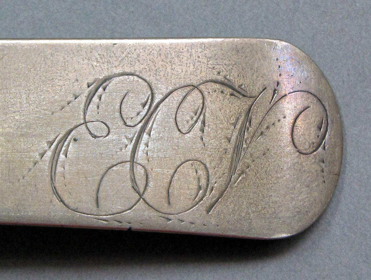 1962.0240.1441 Silver spoon engraving