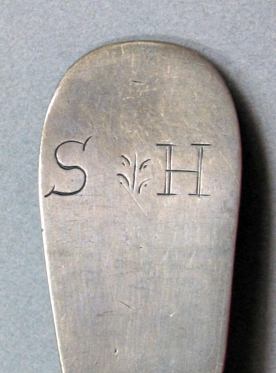 1962.0240.1444 Silver spoon engraving
