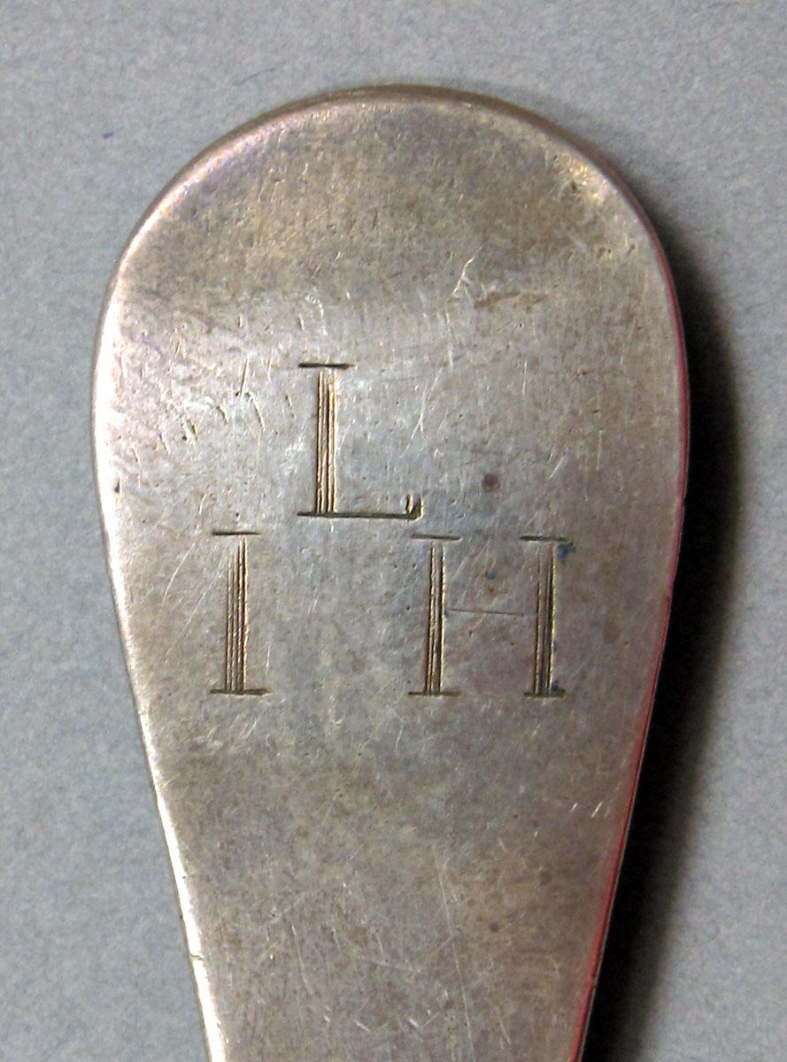 1962.0240.1445 Silver spoon engraving