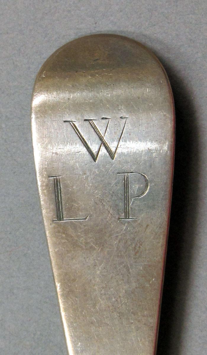 1962.0240.1446 Silver spoon engraving