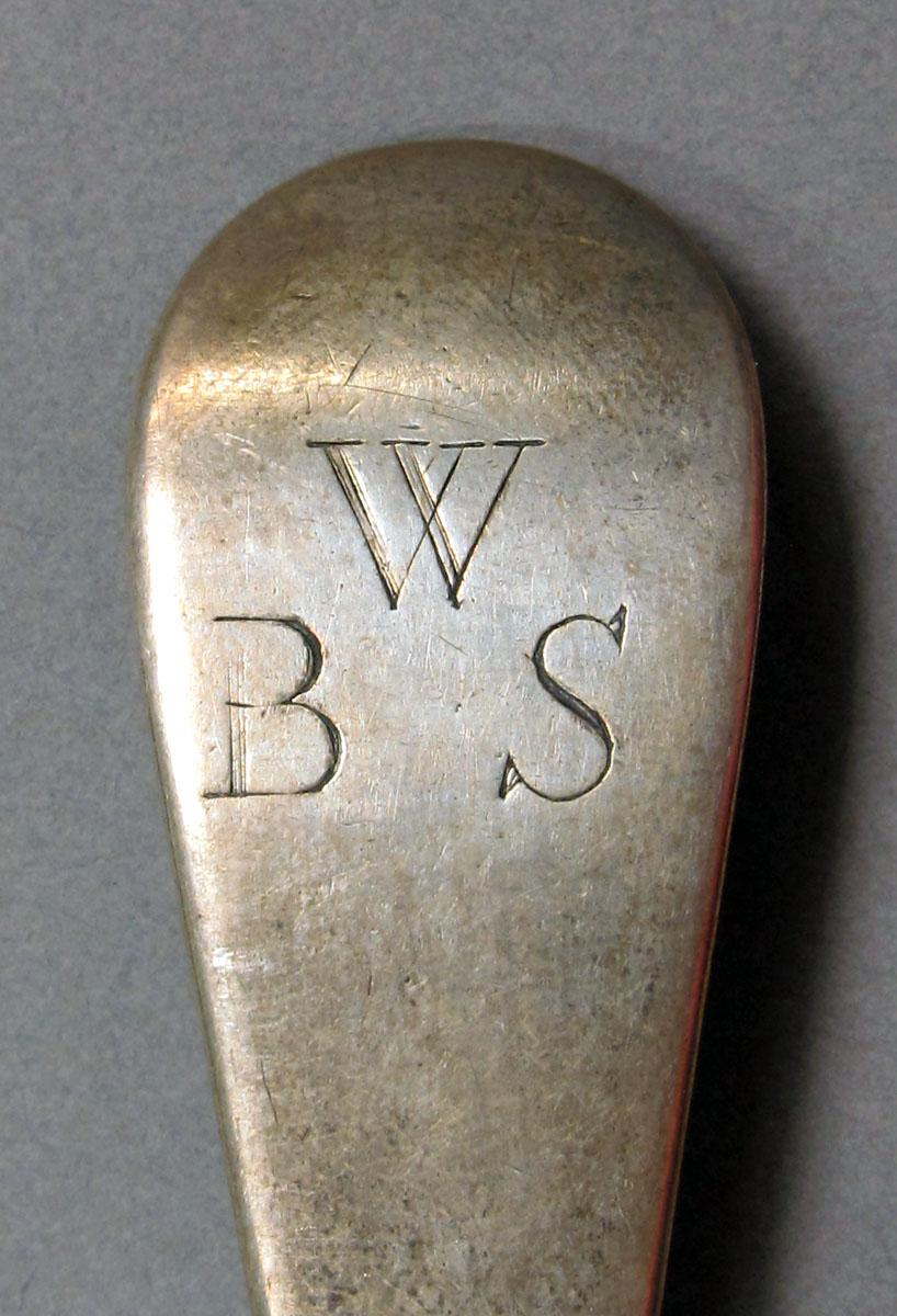 1962.0240.1447 Silver spoon engraving