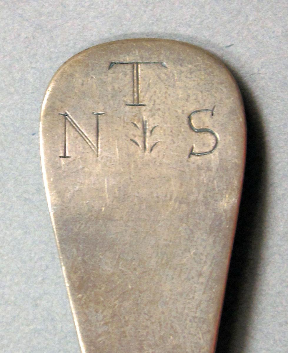 1962.0240.1448 Silver spoon engraving