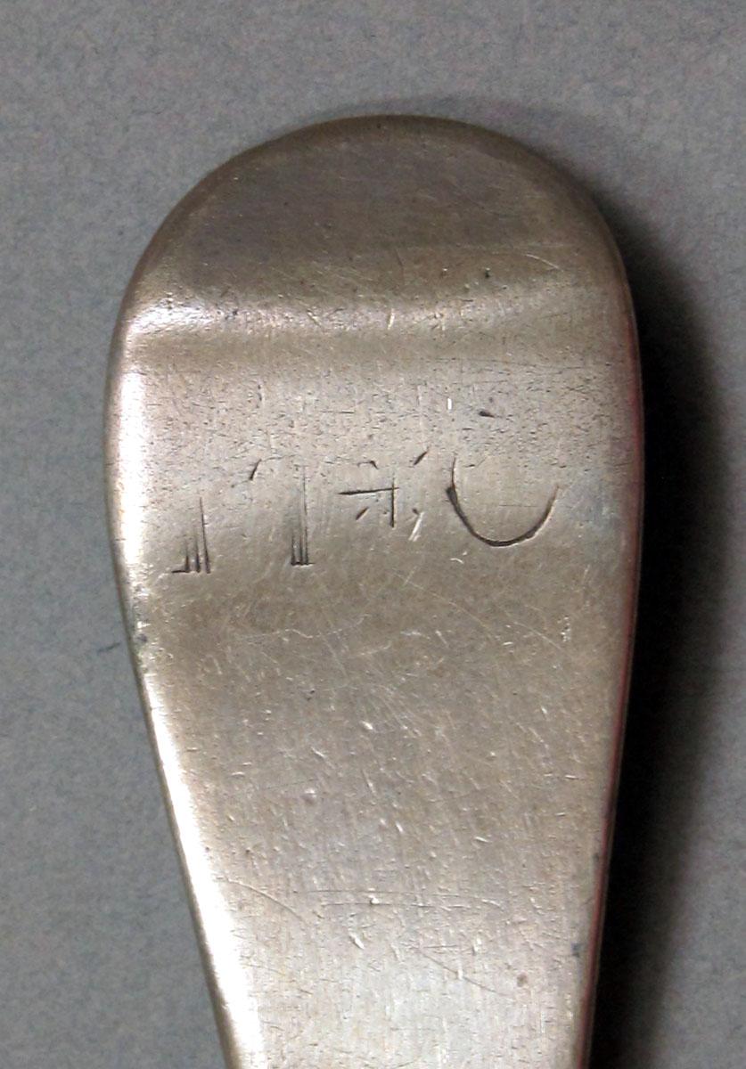 1962.0240.1449 Silver spoon engraving