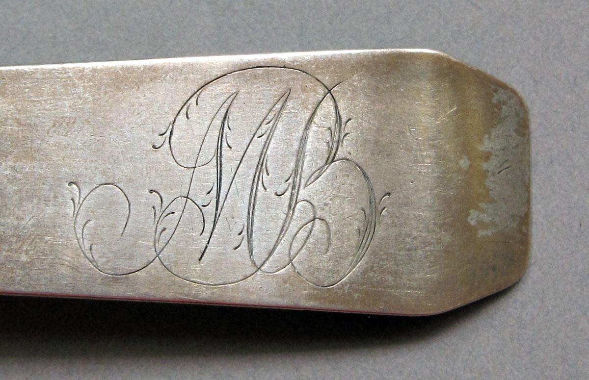 1962.0240.1457 Silver spoon engraving