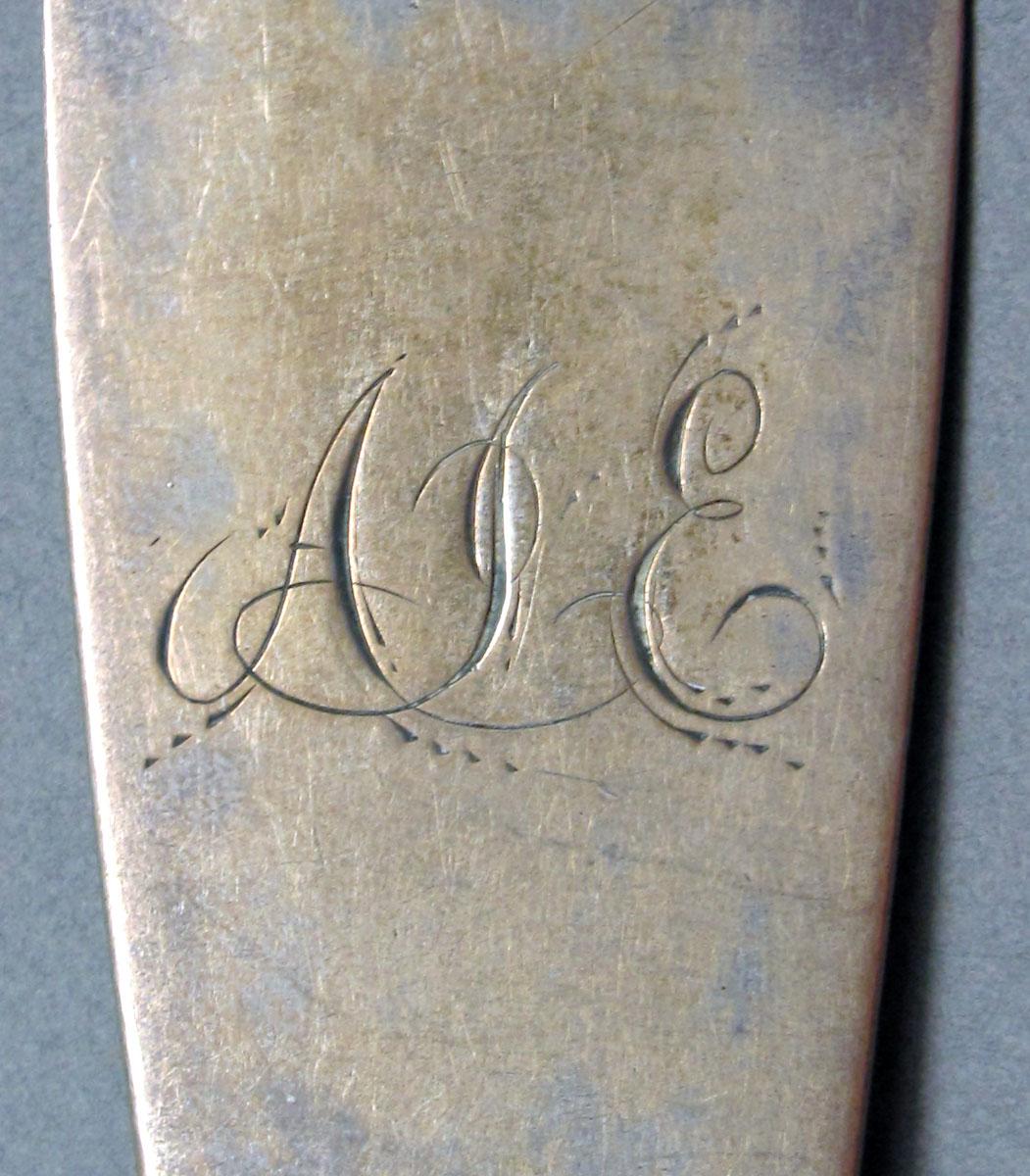 1962.0240.1459 Silver spoon engraving
