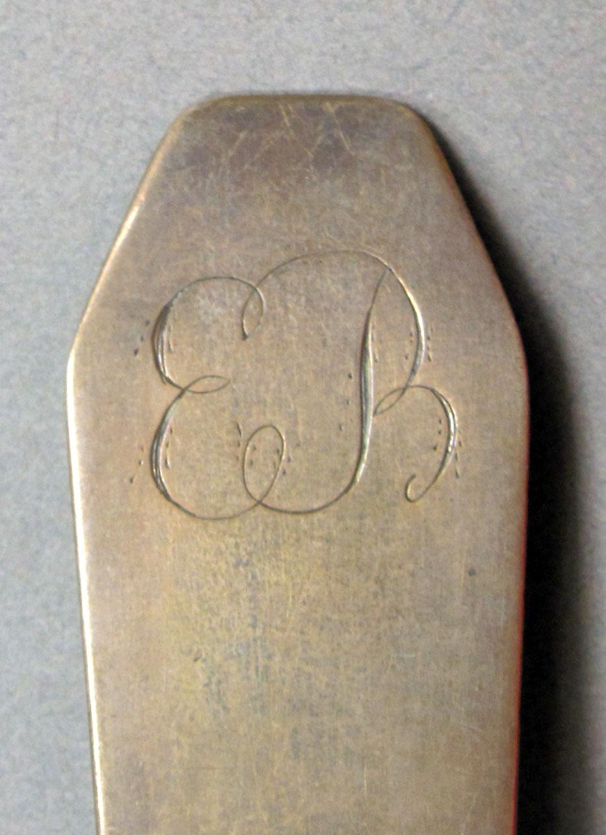 1962.0240.1460 Silver spoon engraving