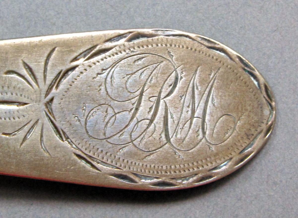 1962.0240.1462 Silver spoon engraving