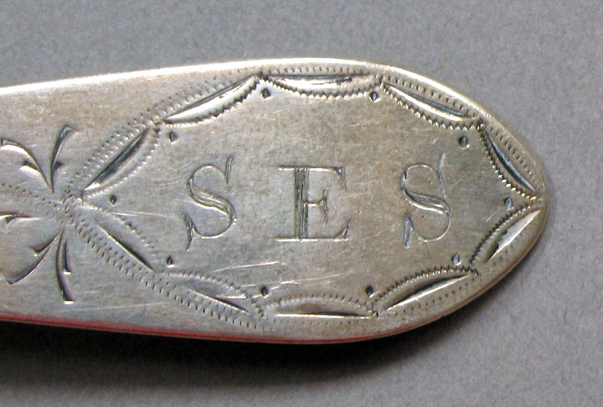 1962.0240.1463 Silver spoon engraving