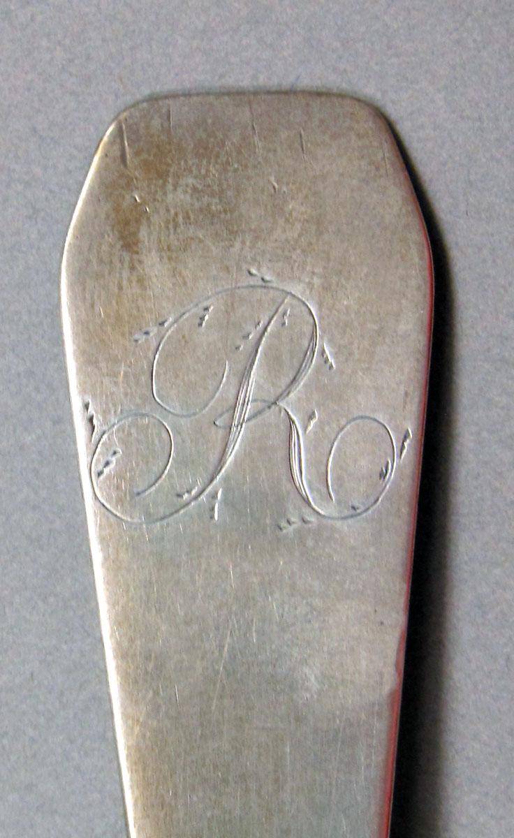 1962.0240.1464 Silver spoon engraving