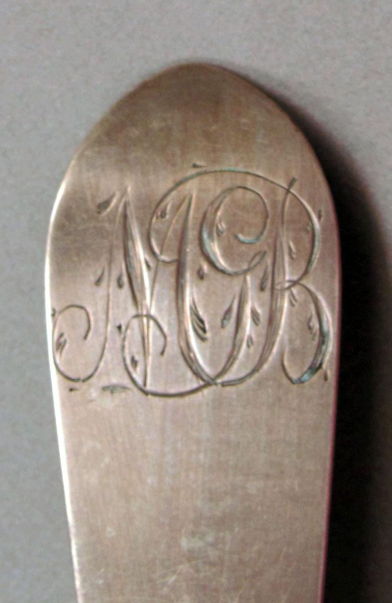 1962.0240.1467 Silver spoon engraving