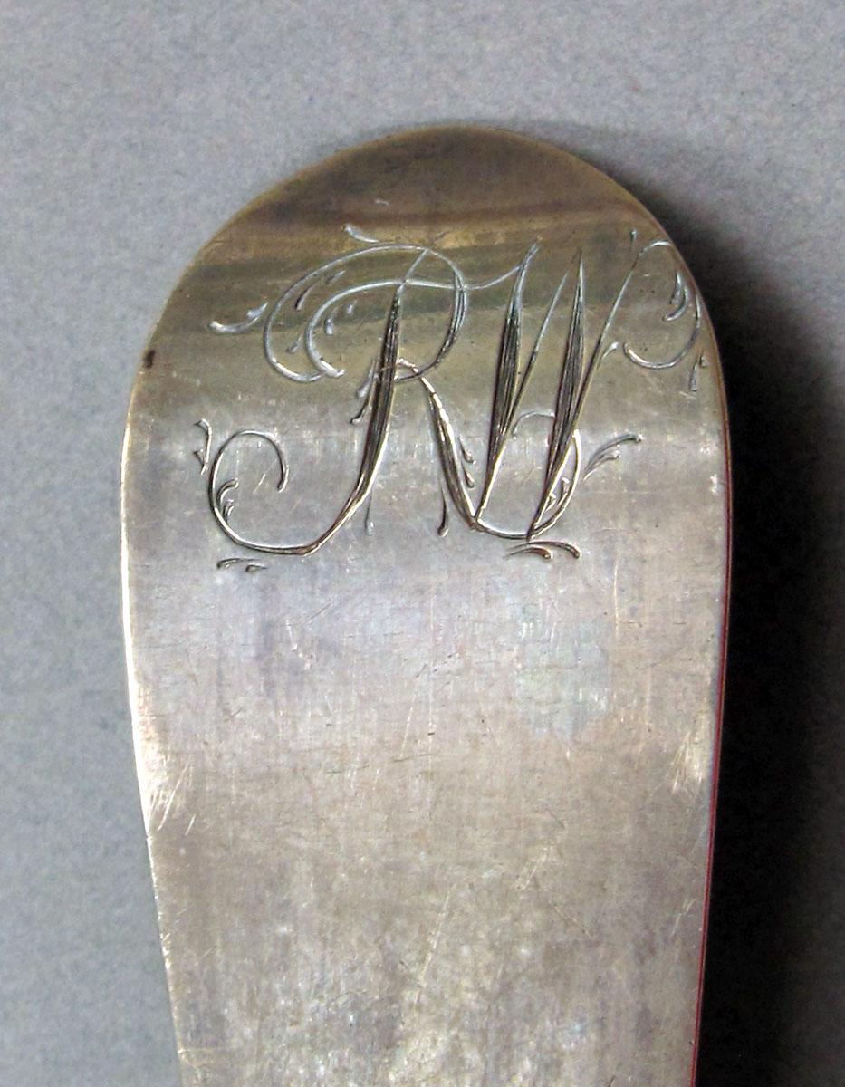 1962.0240.1469 Silver spoon engraving