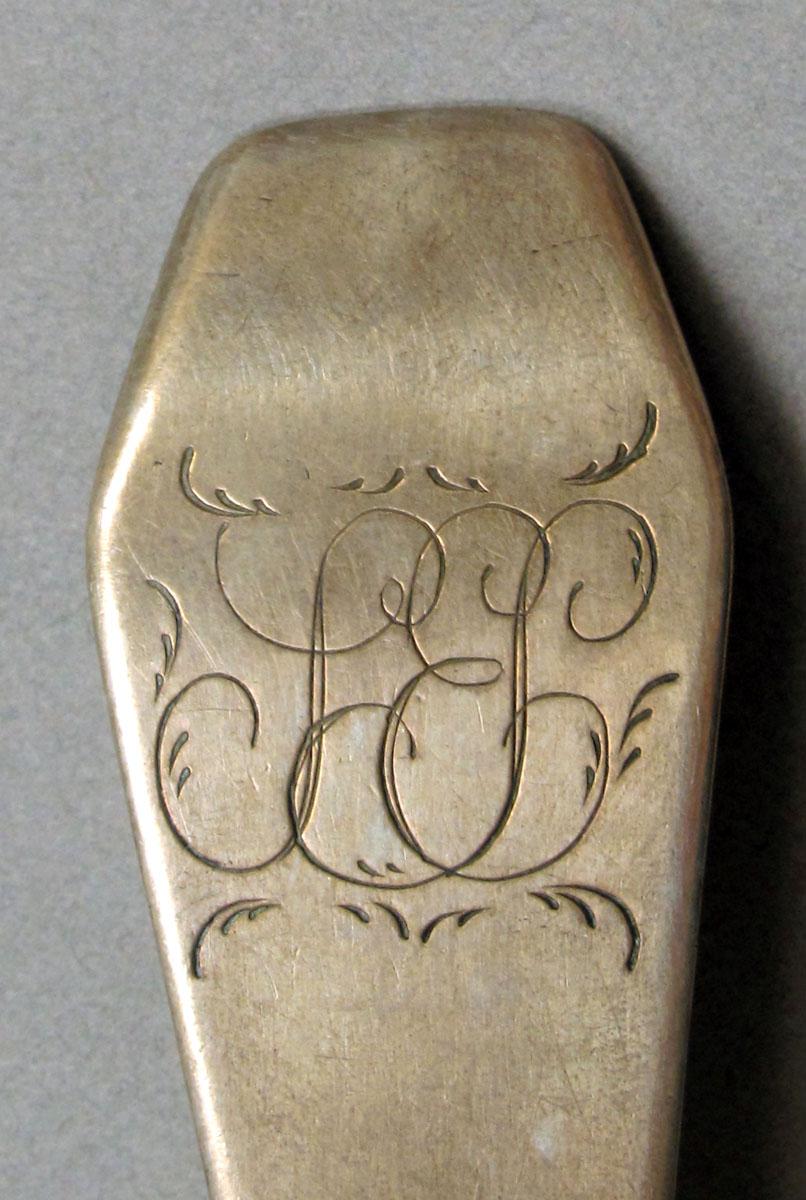 1962.0240.1473 Silver spoon engraving