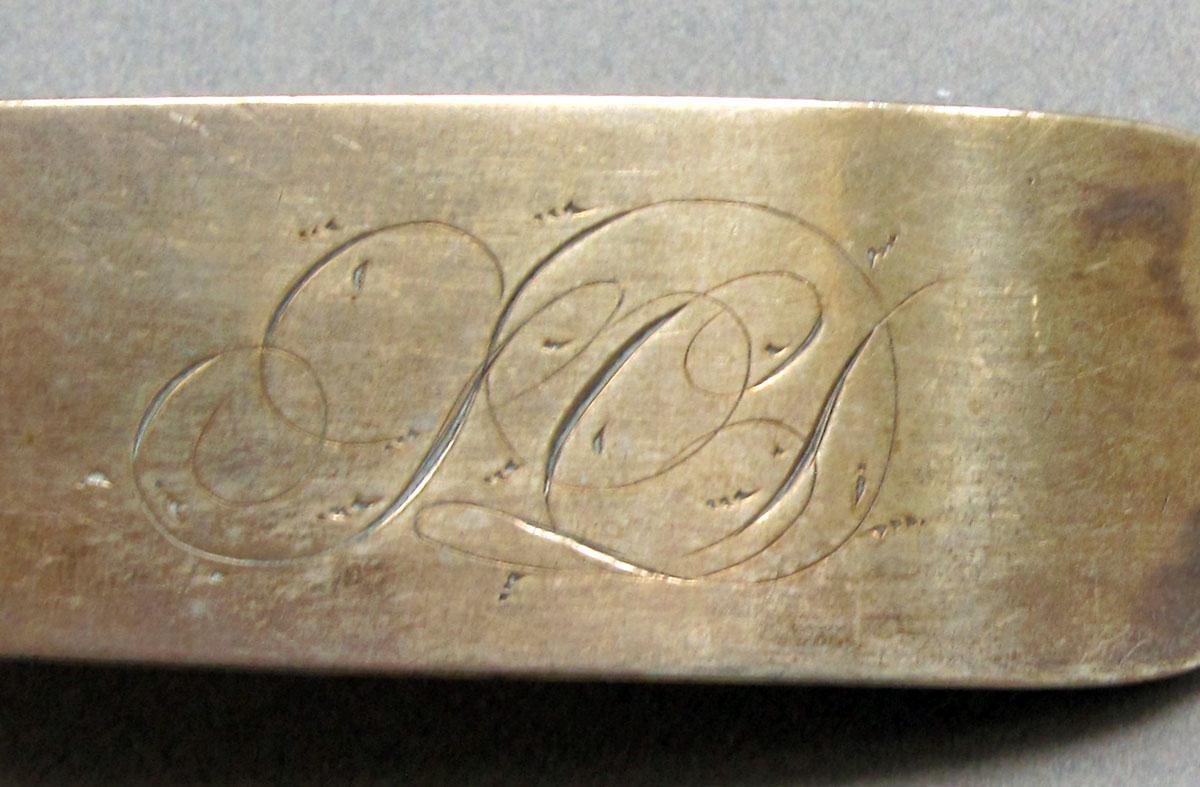 1962.0240.1479 Silver spoon engraving