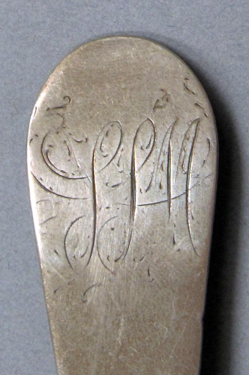 1962.0240.1480 Silver spoon engraving