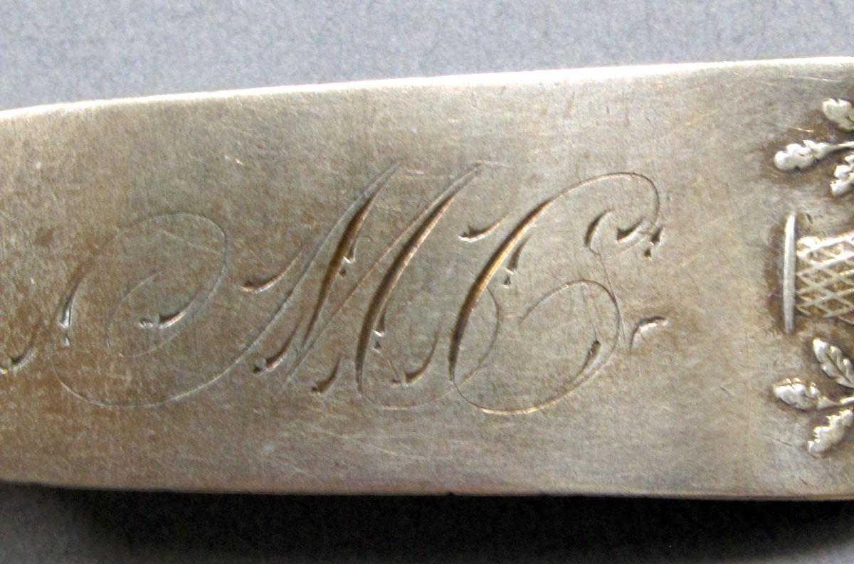 1962.0240.1485 Silver spoon engraving